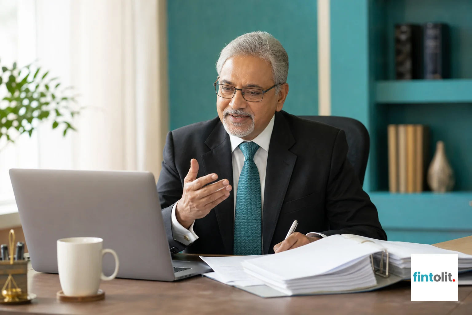 A senior Indian corporate lawyer consulting with a startup founder over documents, video call setup visible. Photorealistic photo of a senior Indian corporate lawyer in formal attire sitting at a desk with a laptop open on a video